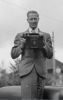 Stuart Thomson holding a Goertz-Anschutz Press camera